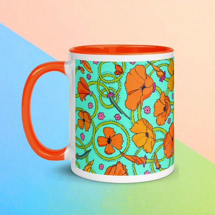 Mug with orange inside and a California poppies print